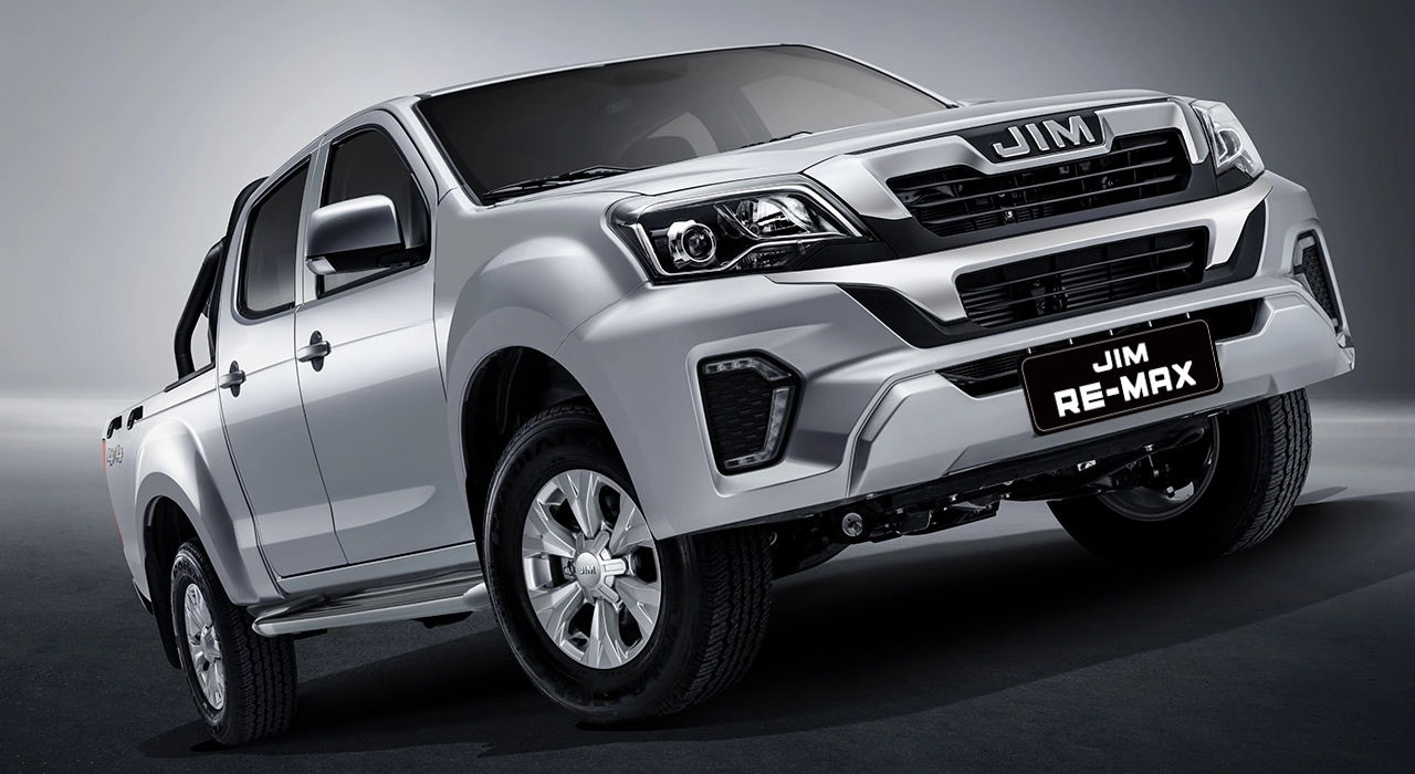 Pickup JIM REMAX color plata en estudio con vista lateral elevada